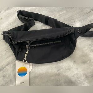 Brand new Black Vuori Sling bag